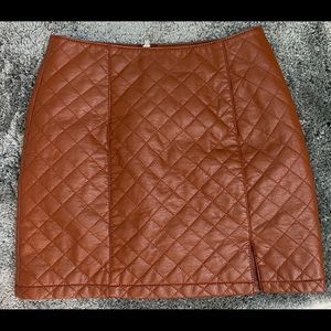 Brown quilted leather mini skirt